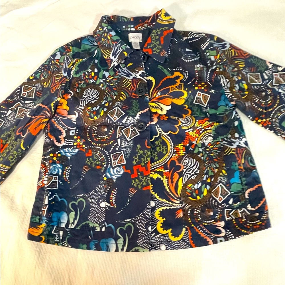 Women’s light weight jacket with floral design. Chico’s size 1 = US size 8